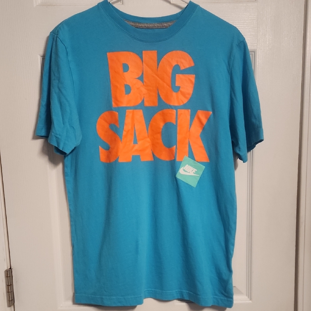 Nike Teal Shirt with Bold Orange Graphic